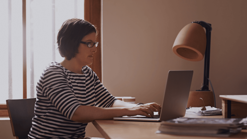 Woman on laptop in office