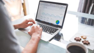 Man using laptop for small business using google analytics